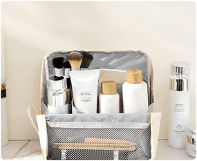 Open organizer filled with bottles and brushes